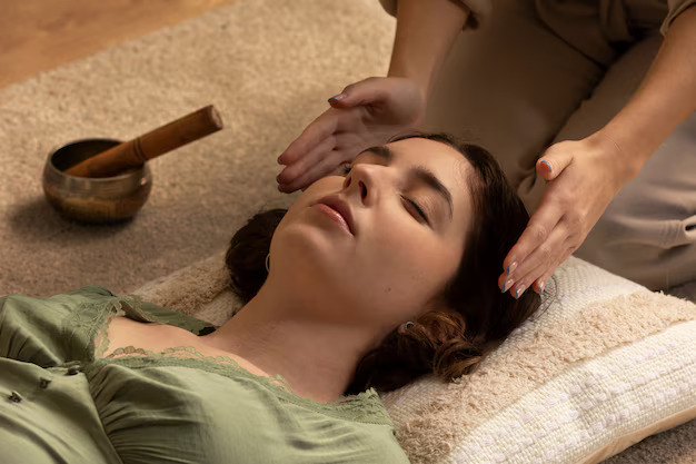 person-conducting-reiki-therapy_23-2149403923.jpg